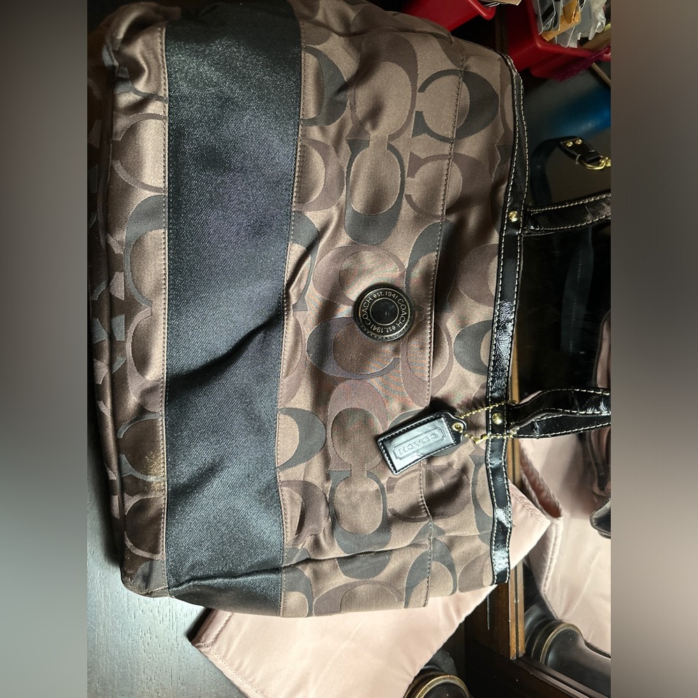 Large Brown Coach Diaper bag with lots of space and pockets